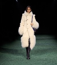 Model in Faux fur trim wool silk blend corduroy trench coat in tundra