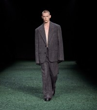 Model in Pinstripe wool tailored jacket in charcoal