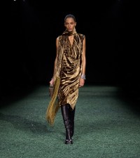 Model in Crushed velvet scarf dress in camp