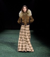 Model in Shearling trim cropped satin parka in bison