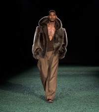 Model in Shearling duffle jacket in dark brown
