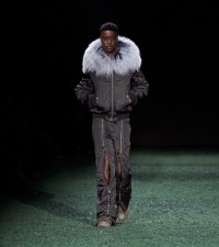 Model in Shearling trim cropped satin parka in bison