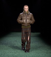 Model in Leather puffer jacket in heath